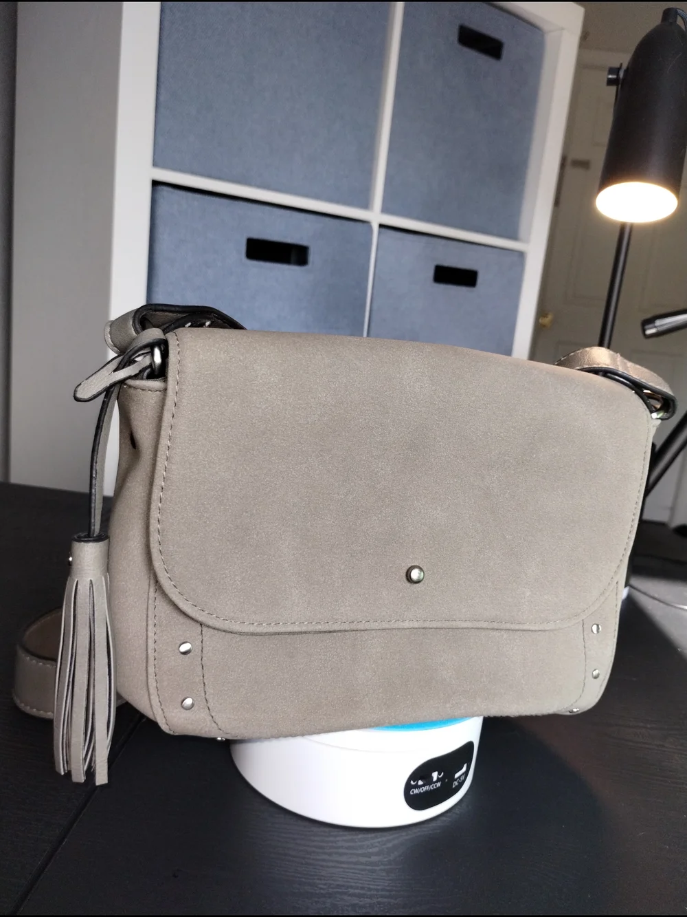 Classic Gray Crossbody Bag with Tassel Accent
